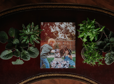 Artifact Uprising Hardcover Photo Book titled The Story of Us featuring family photo of mother with two young children