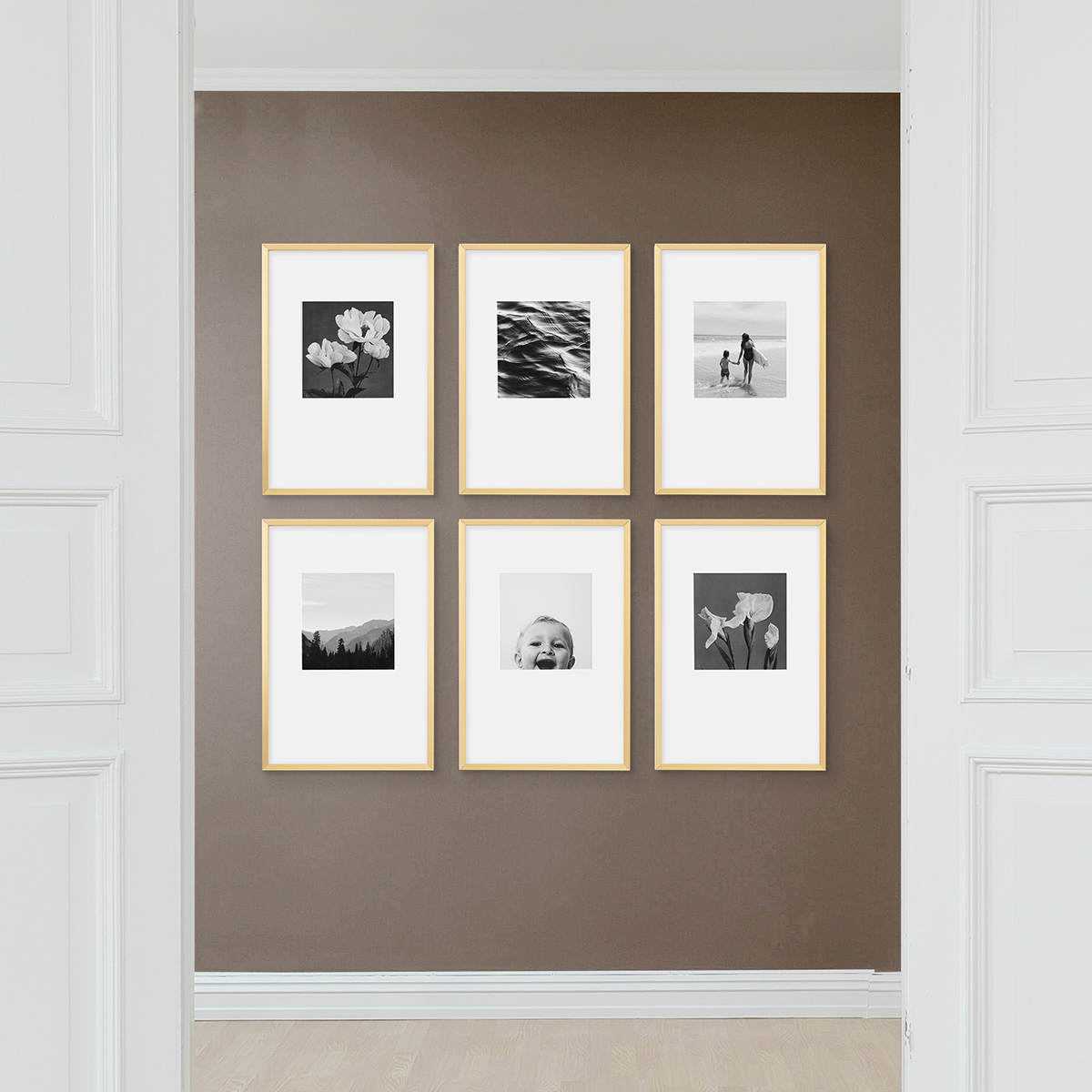 3x2 grid of Artifact Uprising Modern Metal Frames featuring black and white family photos