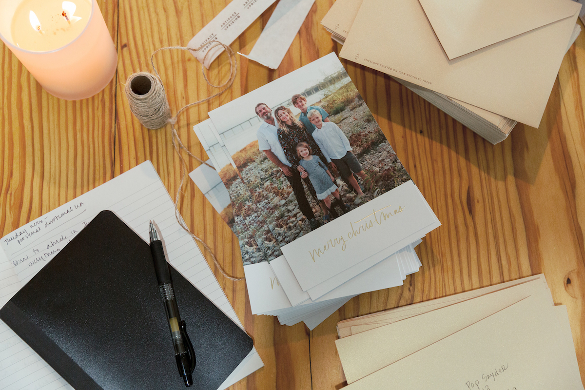 all the holiday card mailing materials on the dining table