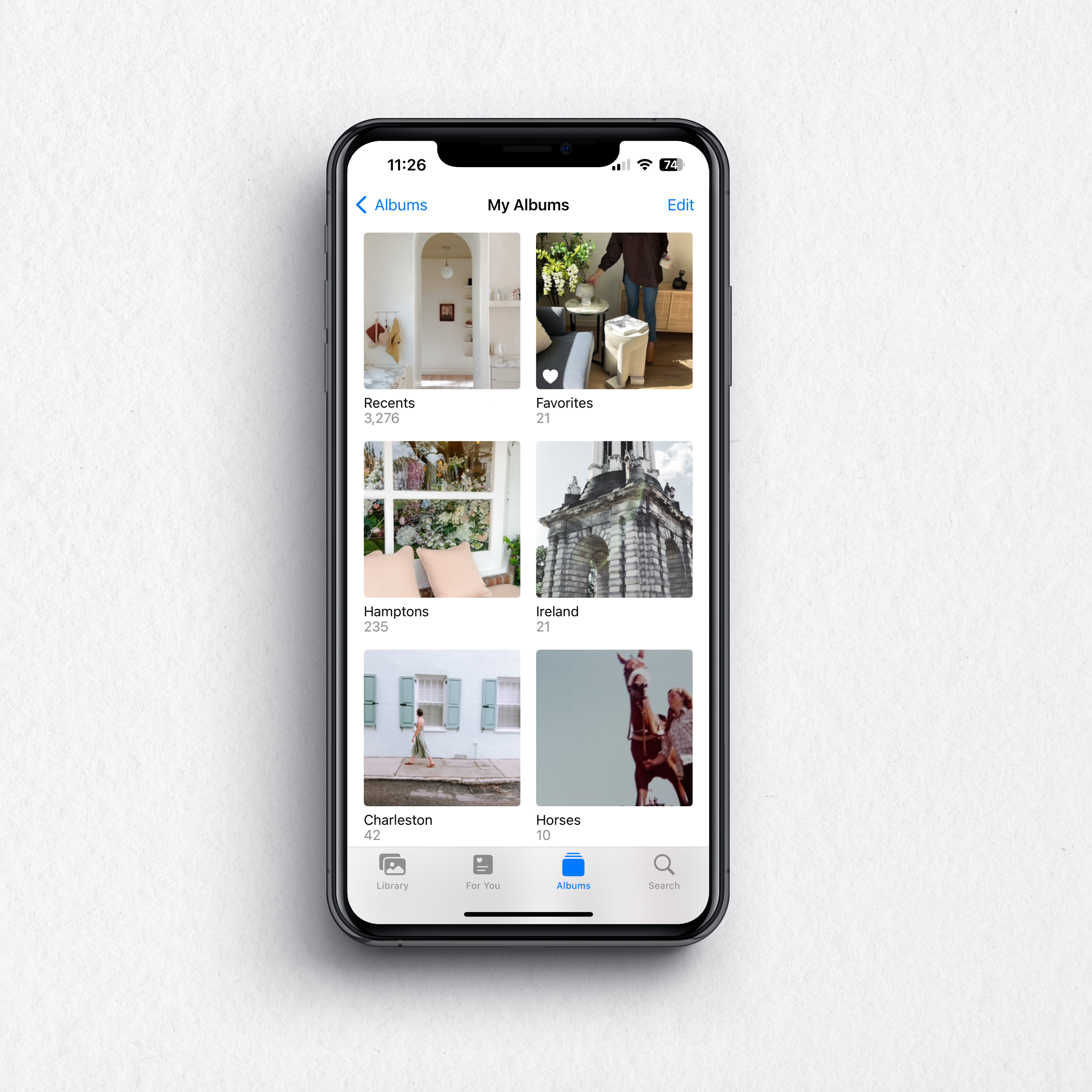 grid of photo albums on iphone screen
